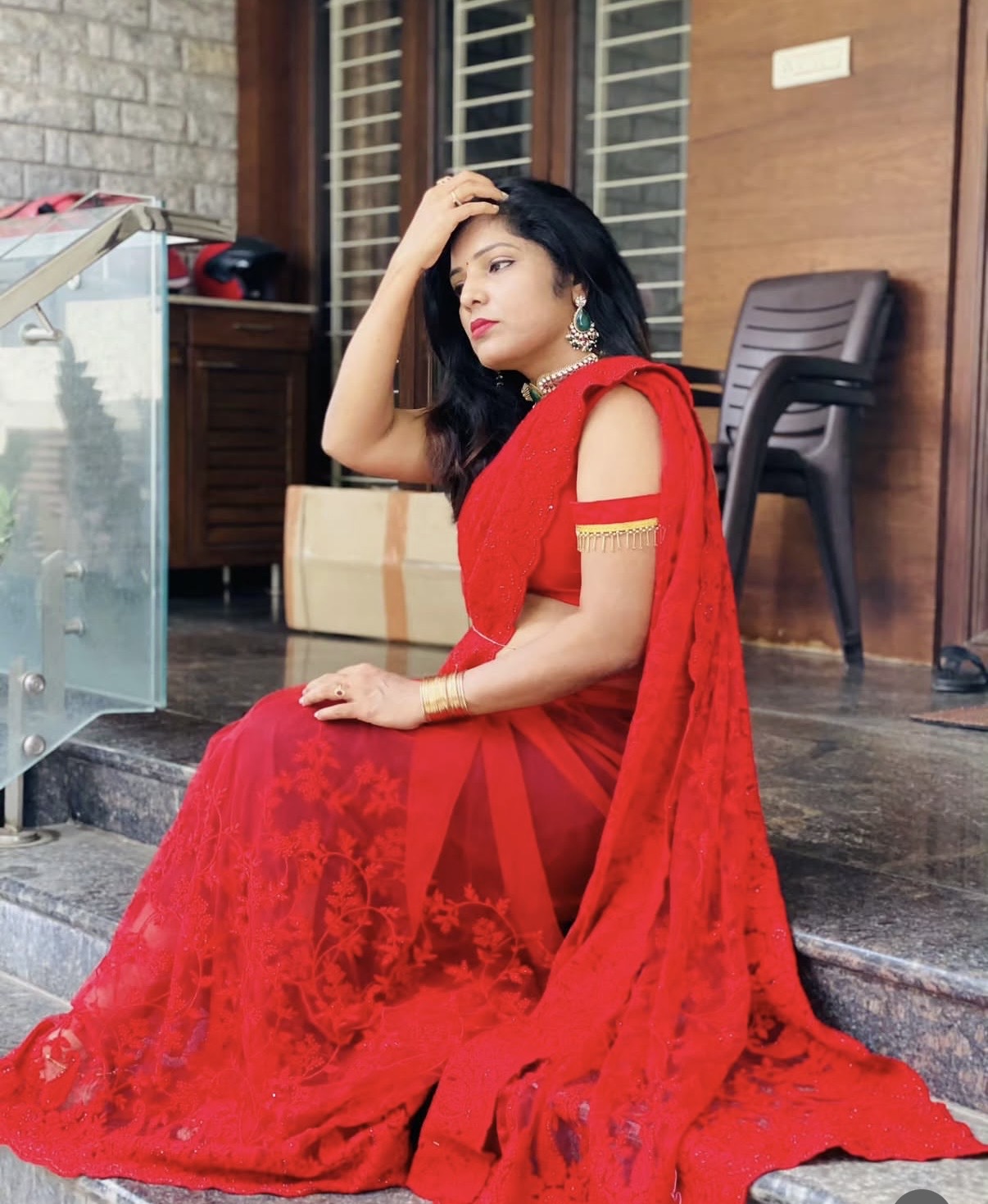 Red embroidery work saree